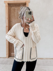 What You Need Stitched Cable Knit Sweater